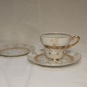 Sterling China Gold and White Tea Cup Set w/Additional Saucer